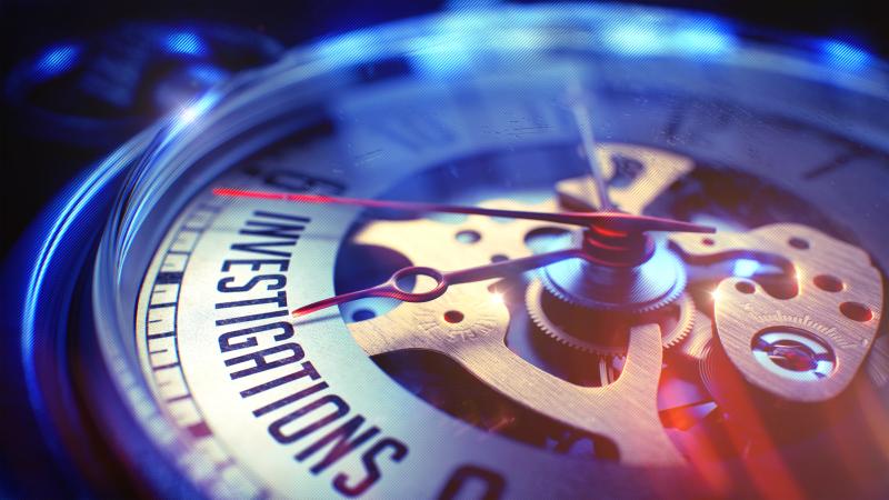 Photograph of Investigations printed on vintage pocket watch