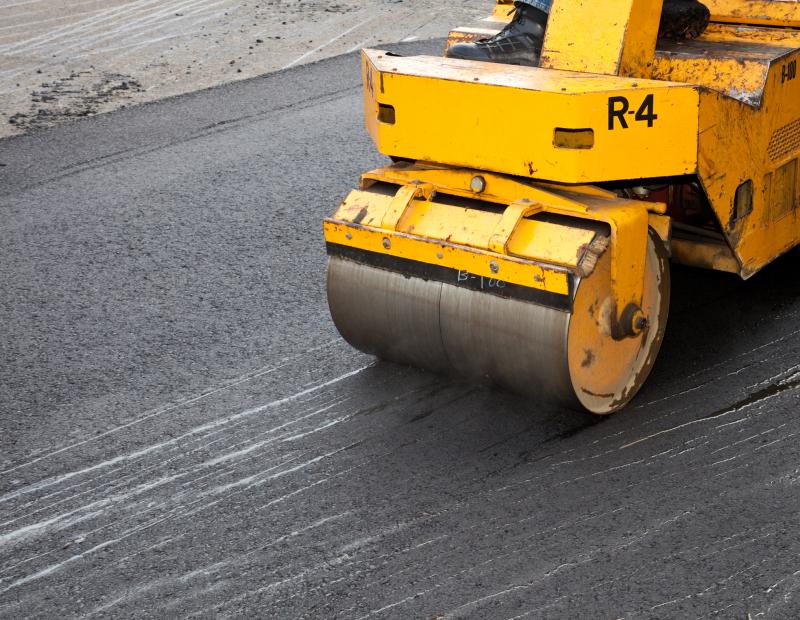 Photograph of Crew paving a driveway