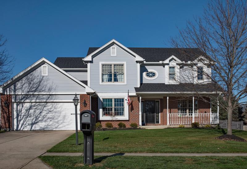 Photograph of Mailbox in front of a house