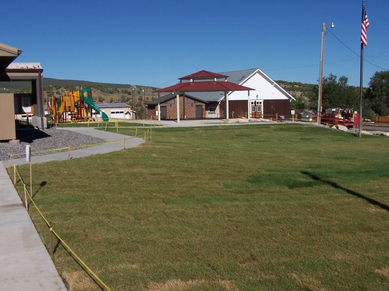 A side view of the center and playground that sits out front