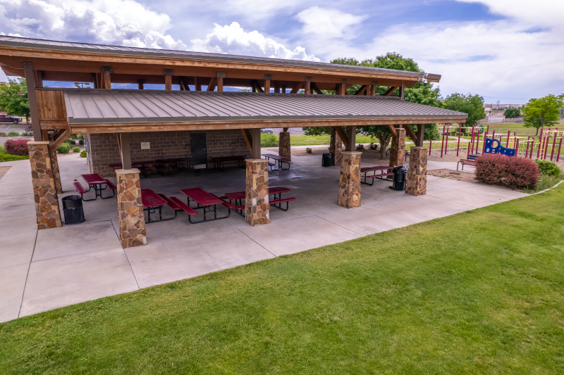 Aerial view of the gazebo and several red picnic tables under it