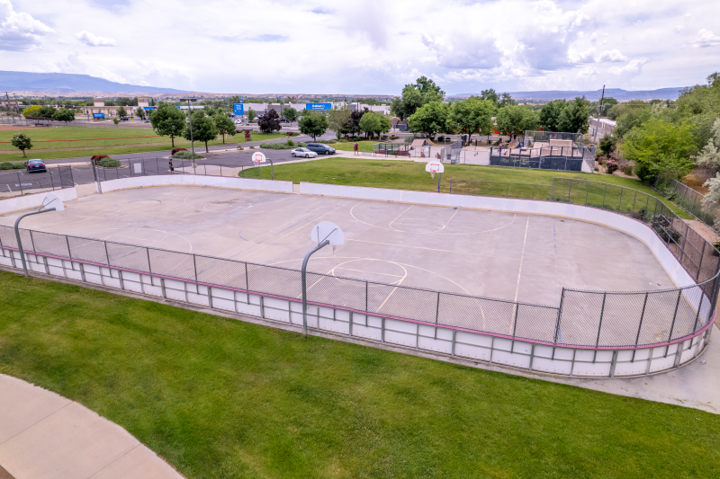 Aerial view of the combination summer basketball court and winter hockey rink