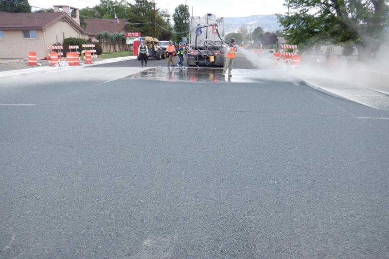 Construction equipment on fresh road. 