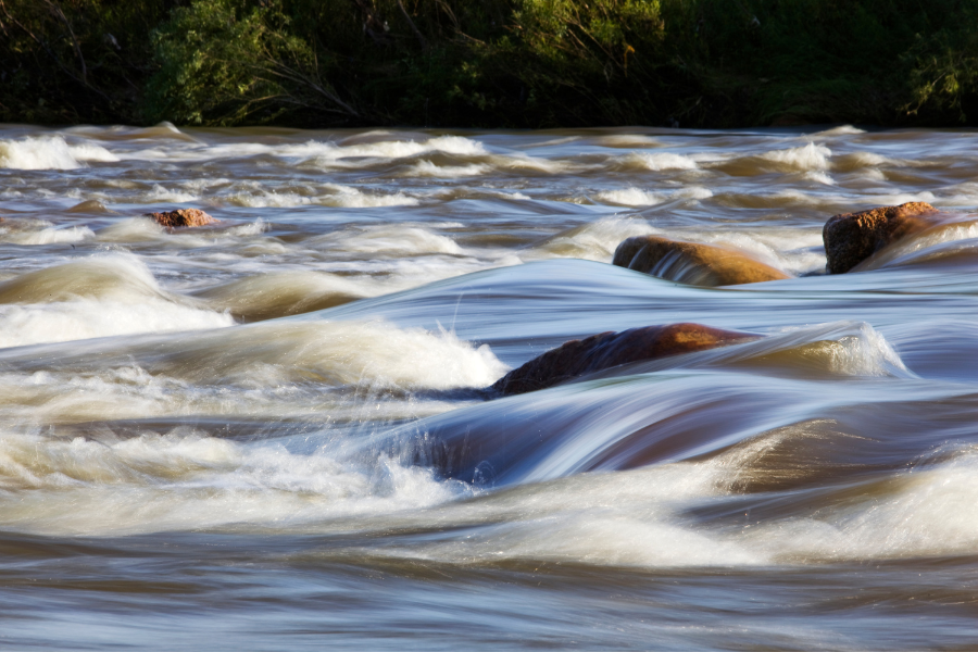 River water flows over rocks